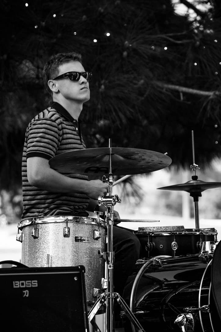 Isaac Harrell drumming outdoors